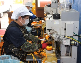 自動皮むき機